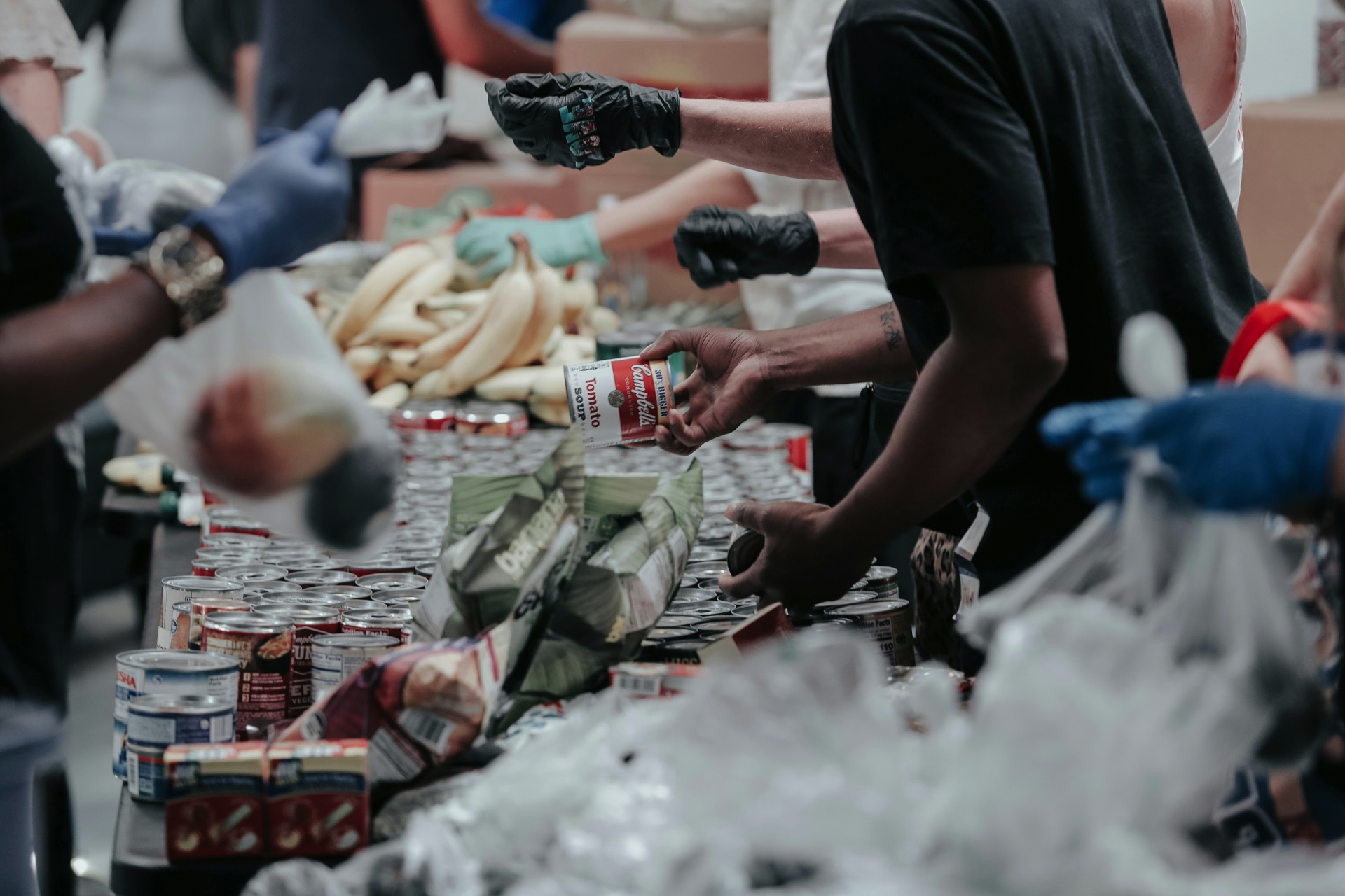 Volunteers sorting donated food